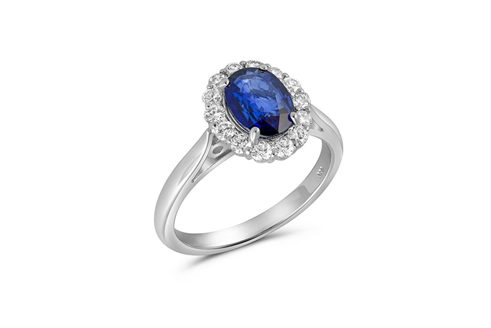 Elegant 18K White Gold Cluster Ring with Oval Blue Sapphire and Diamond Accents